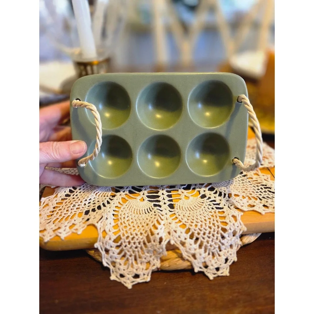 sage green ceramic earthenware egg holder with rope handles
